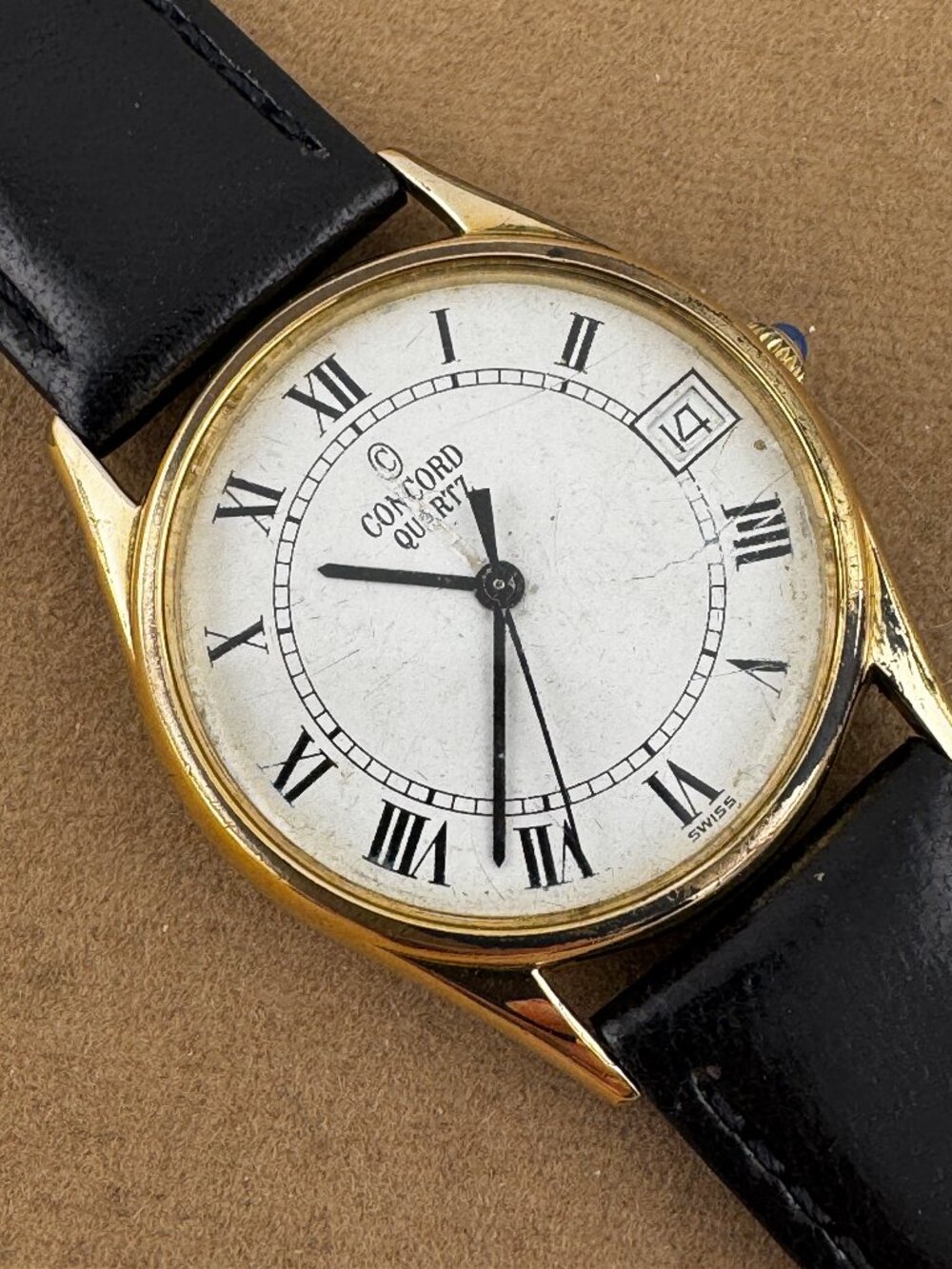 Vintage Man's Concord wristwatch features a classic design